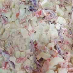 A picture of Tomato cucumber salad.