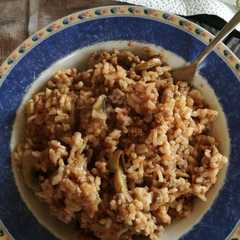 A picture of Risotto funghi e sugo.