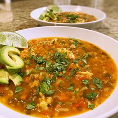 A picture of Asopoa de Camarones (shrimp and rice soup).