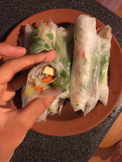A picture of Satay tofu rice paper rolls.