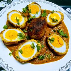 A picture of Potato Egg Nargisi Malai Kofta.