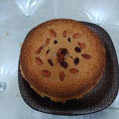 A picture of Suji cake in Cooker.