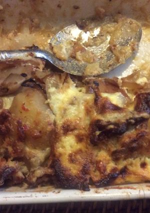 A picture of Spicy oven baked sautéd potato and bacon gratin.
