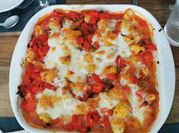 Une photo de gnocchi mozzarella