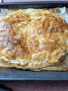 Una foto de Empanada de pollo y manzana