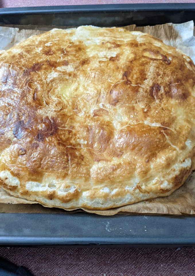 Una foto de Empanada de pollo y manzana