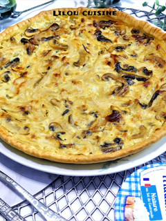 Une photo de Tarte oignons/ champignons