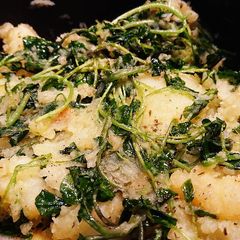 A picture of Crushed Potatoes With Watercress In Olive Oil.