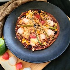 A picture of Thin Crust Ragi Pizza.