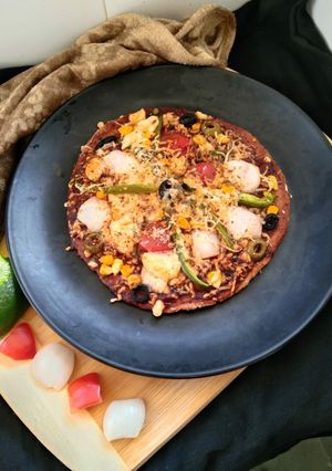 A picture of Thin Crust Ragi Pizza.