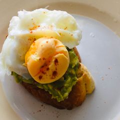 A picture of Avocado and poached egg on toast.