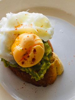 A picture of Avocado and poached egg on toast.