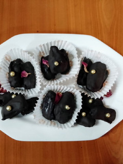 A picture of Dates,almonds chocolate 🍫.