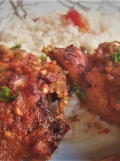 A picture of Grilled chicken with peri peri sauce.