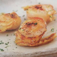A picture of Pan-fried scallops with shichimi and ponzu.