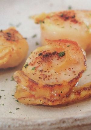 A picture of Pan-fried scallops with shichimi and ponzu.