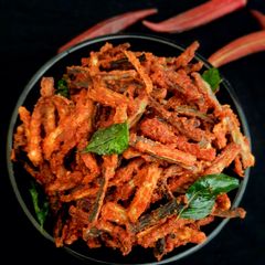 A picture of Red ladies finger kurkure.