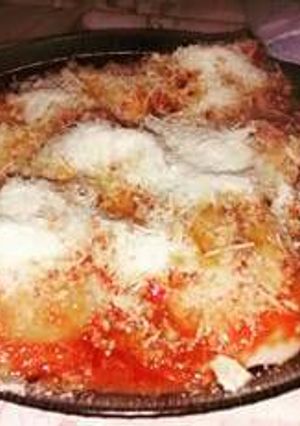 Una foto de Sorrentinos de jamón y queso