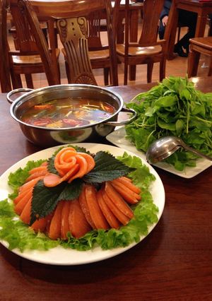 Hình của món Lẩu cá hồi chua cay.
