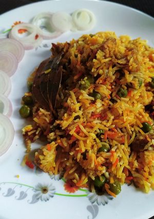 A picture of Matar paneer biryani.