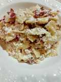 Farfalle alla crema di ricotta e bresaola con pistacchi al profumo di limone