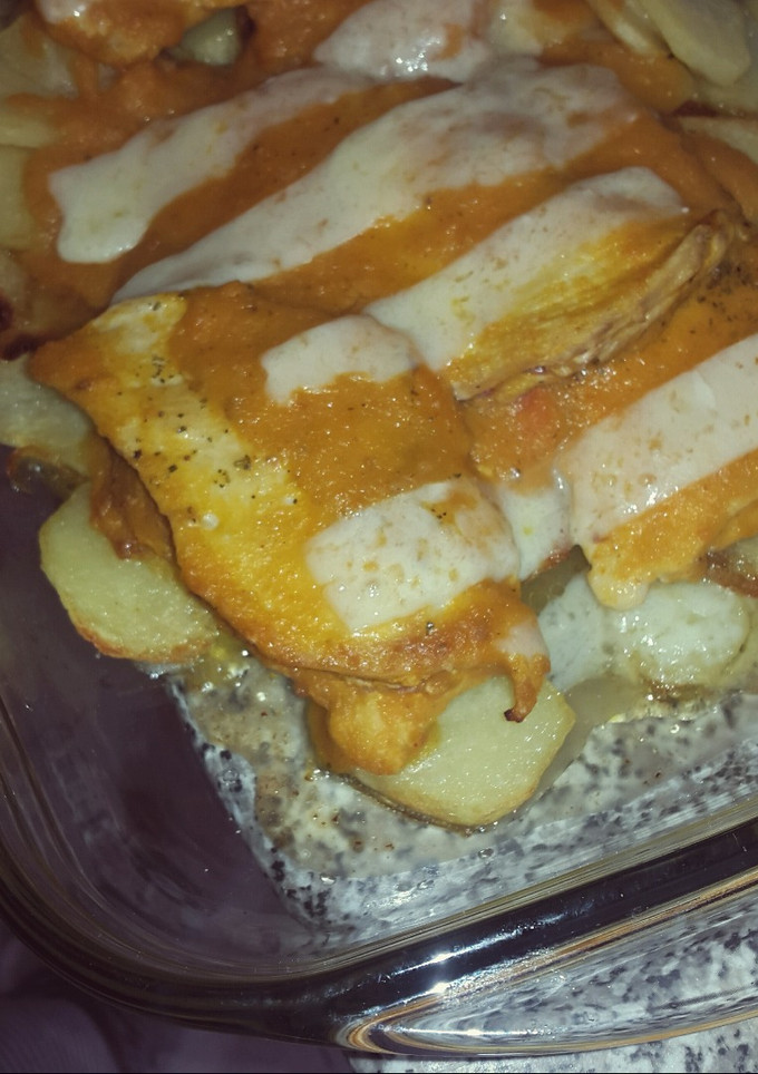 Una foto de Filetes de pollo rellenos en salsa