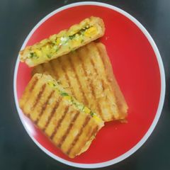 A picture of Corn and Spinach Toast.