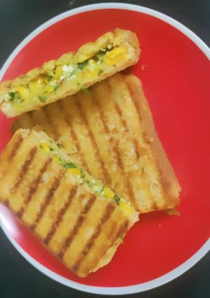 A picture of Corn and Spinach Toast.