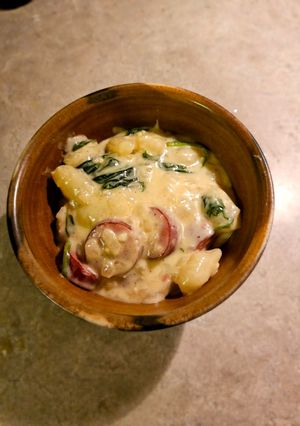 A picture of Gnocchi with Spinach and Chicken Sausage.
