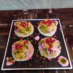 A picture of Cheesy samosa bites chaat.