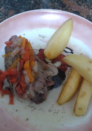 Una foto de Osobuco supertierno con papas al horno