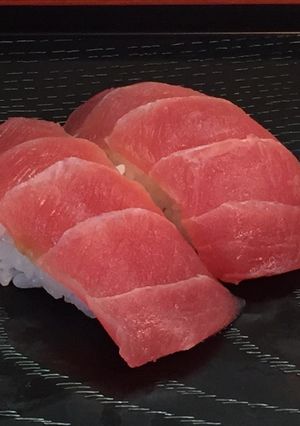 A picture of Traditional Tuna Nigiri Sushi.