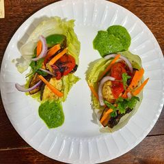 A picture of Grilled vegetable lettuce pockets.
