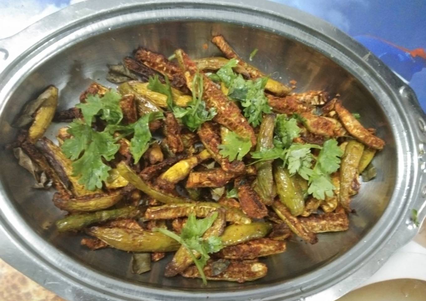 Zucchini fried with ivy in a pan without oil