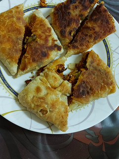 A picture of Mughlai chicken paratha.