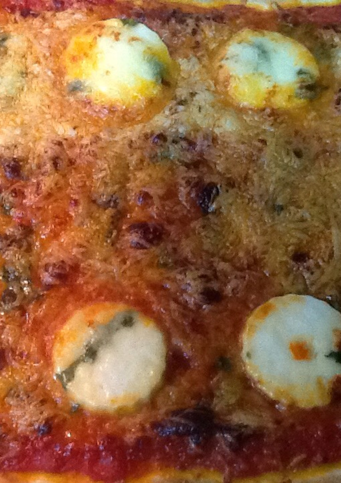 Una foto de Pizza de queso fresco