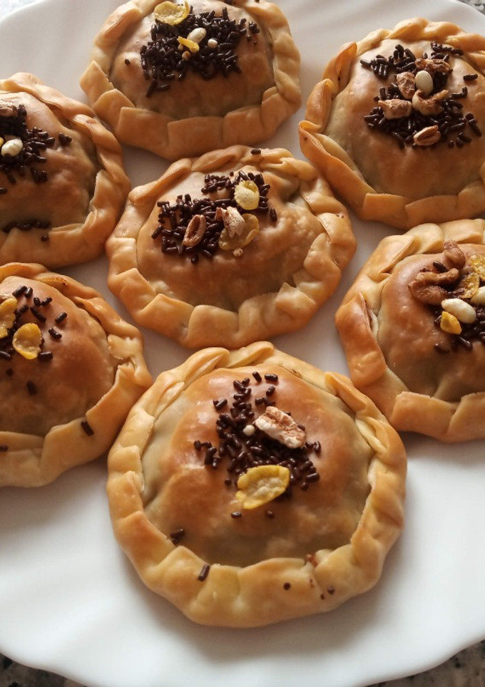 Una foto de Obleas rellenas de crema de chocolate y mix de cereales