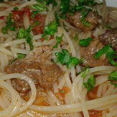 A picture of Spaghetti & beef stew.