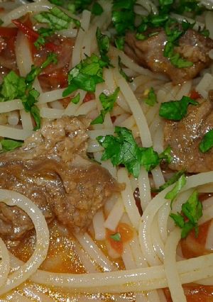 A picture of Spaghetti & beef stew.