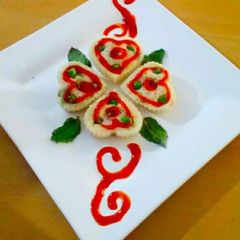 A picture of Stuffed Idli hearts.