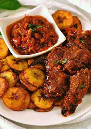 A picture of Fried bananas and chicken.