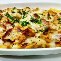 A picture of Bacon and cheese loaded potato fries.