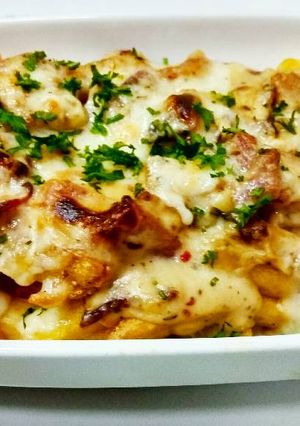 A picture of Bacon and cheese loaded potato fries.