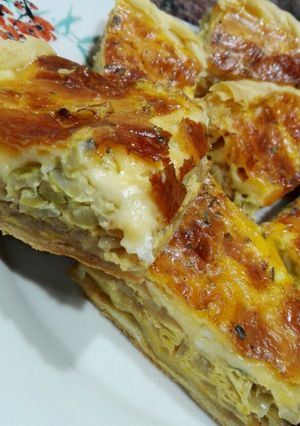 Una foto de Tarta de queso y cebolla