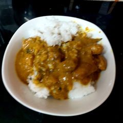 A picture of My Lovely flavoured Curried Chicken with Rice.