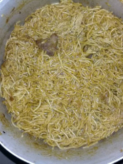 A picture of Spaghetti and chicken.