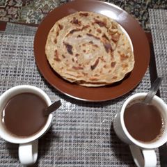 A picture of Brown chapatis.