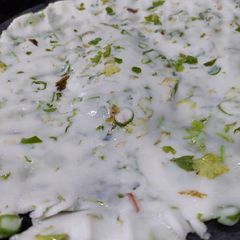 A picture of Green n white roti.