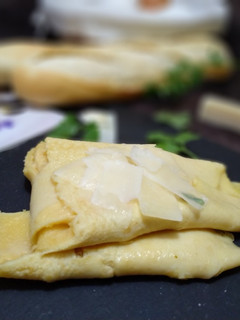 Una foto de Tortilla de harina y parmesano
