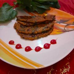 A picture of Spinach oats pan cake.